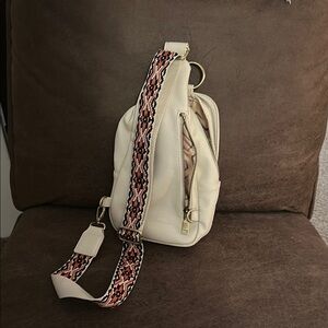 Stylish Cream Crossbody Bag with Patterned Strap